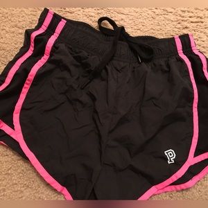 Pink brand activity shorts with built in liner.